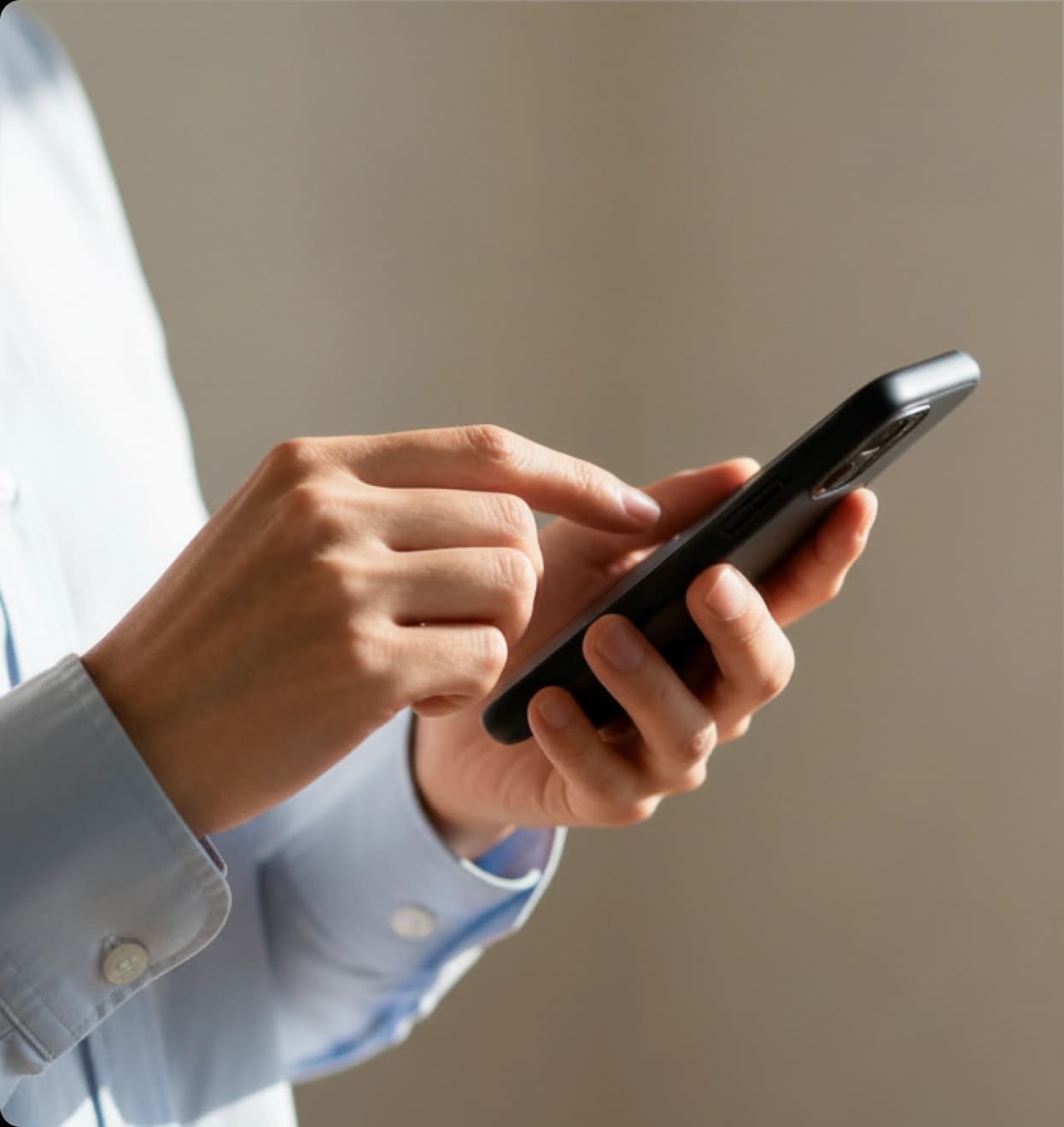 Investor reviewing private capital opportunities on a smartphone through Godrej Wealth